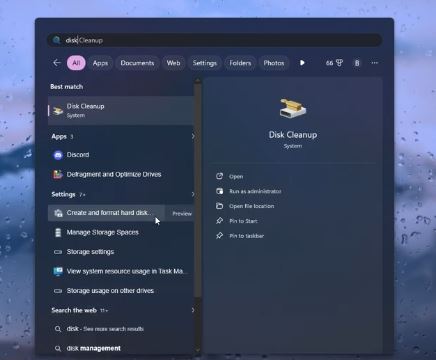 Disk Cleanup tool open in Windows 11 with drive selection prompt
